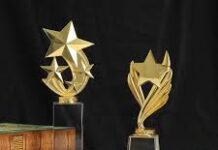 PREMIOS Y RECONOCIMIENTO